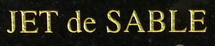 Inscription en or 'JET de sable'